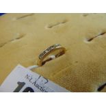 An 18ct gold and diamond ring