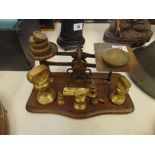 A set of scales and brass weights