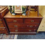 A Mahogany two over three chest of drawers