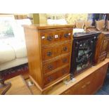 A Cross banded chest of four drawers