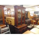 An Edwardian Mahogany bookcase on cupboard base