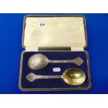 A set hallmarked Silver gilded Walker and Hall serving spoons,