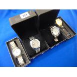 Four boxed watches