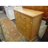 An oak two over three chest of drawers