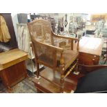 A bergere elbow chair