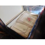 A qty of linen in suitcase