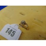 An 18ct Gold and Diamond dress ring,