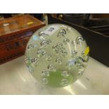 A large glass paperweight