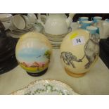 Two painted Ostrich eggs,