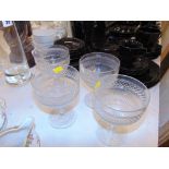 A set of four early glass grapefruit dishes