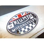 A wrought iron Triumph motor cycle plaque