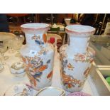 A pair of decorative Orange and White vases