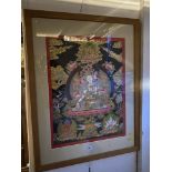 A framed silk oriental panel