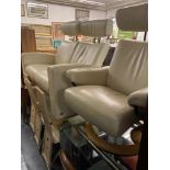 A retro reclining leather settee and armchair