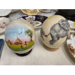 Two painted Ostrich eggs,