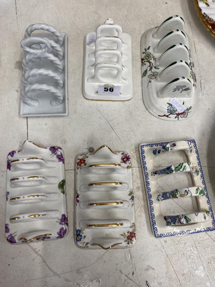 Six porcelain toast racks