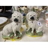 A pair of small early Staffordshire dogs