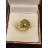 An 14ct gold, Diamond and Emerald ring,