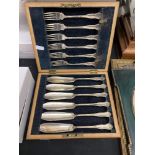 A EPNS cutlery fish set in brass inlaid box