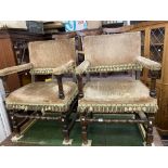 A pair of elbow chairs,