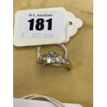 An 18ct gold, seven stone Diamond ring, total weight approx. 1.