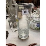 A glass jug with Silver 925 rim B & Co.
