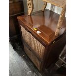 A Mahogany and rattan two drawer cabinet