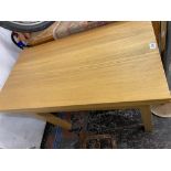 a modern draw leaf table