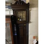 An Oak barley twist Grandfather clock