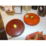 Two leather tape reels