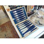 A EPNS cutlery fish set in brass inlaid box