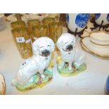 A pair of small early Staffordshire dogs