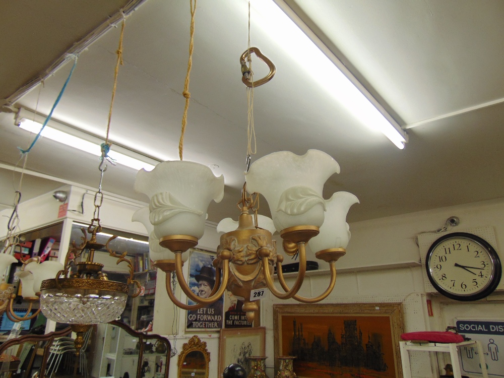 A pair of five branch up light fittings