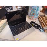 A Dell Inspiron laptop 4gb/ 128gb SSD working with charger