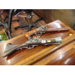 Two replica flintlock guns