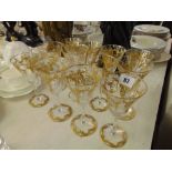 A set of 12 good quality twist stem glasses