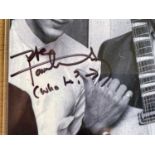 THE WHO ROGER DALTREY SIGNED BOOK AND PETE TOWNSHEND SIGNED PHOTOGRAPH. Copy of Roger's