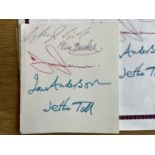 JETHRO TULL SIGNED CARD. A piece of 3"x3" card signed by the band members of Jethro Tull to