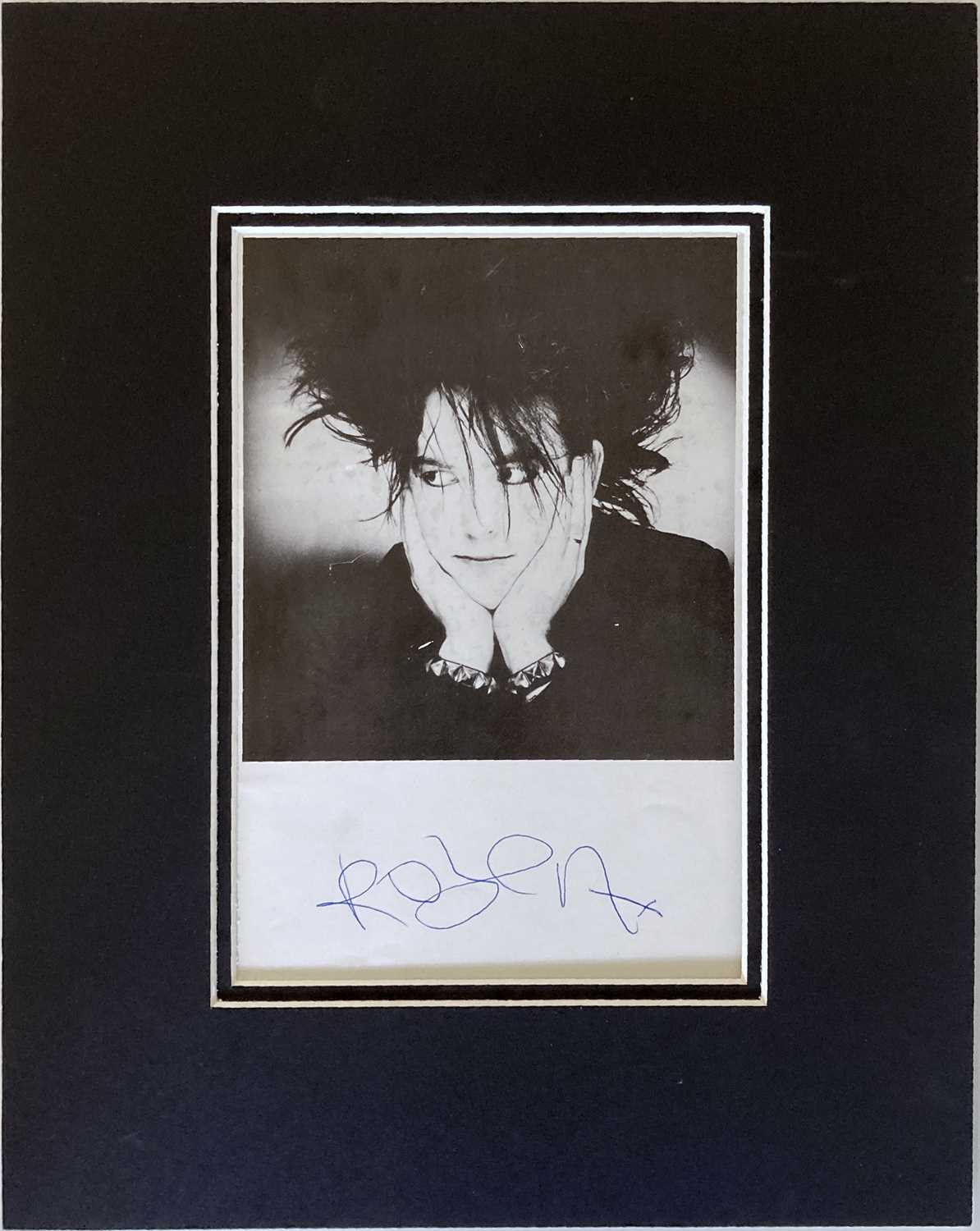 THE CURE - ROBERT SMITH SIGNED PROMOTIONAL PHOTOGRAPH.