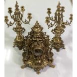 FRENCH GILT CLOCK AND MATCHING CANDELABRAS