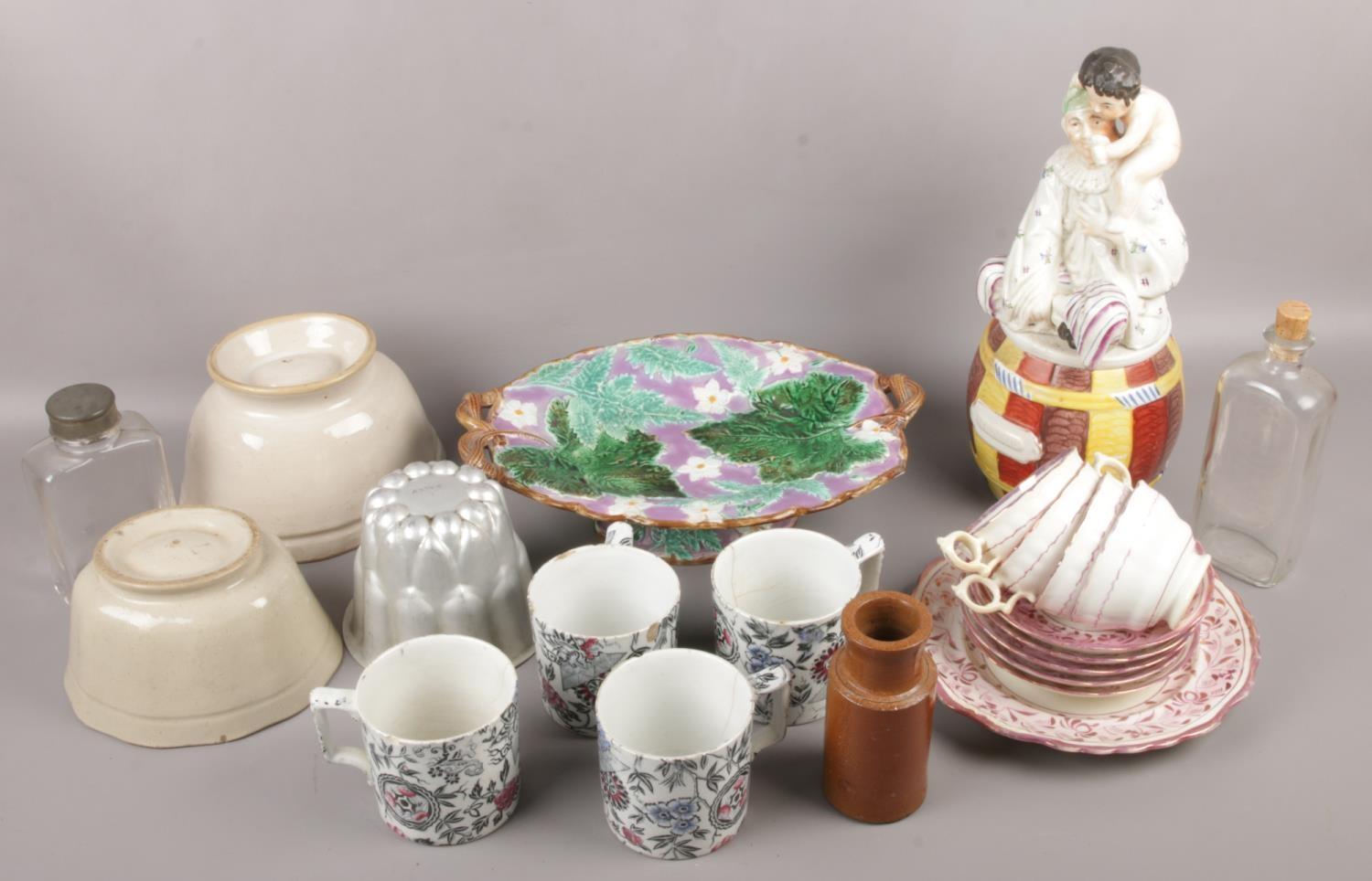 A collection of mostly 19th century ceramics to include Staffordshire figural tobacco jar, jelly