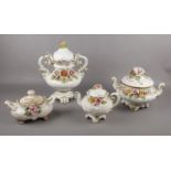 A collection of Capodimonte ceramics, varying sized lidded pots and teapot.