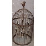 A 12 branch glass droplet chandelier surrounded by a vintage mental bird cage. (90cm tall)