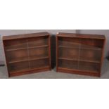 A pair of mahogany Gibbs bookcases with glass sliding doors. (84cm x 91cm)