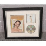 A Framed autograph picture and Fever CD for Kylie Minogue, to include framed photograph of Kylie