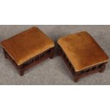 A pair of Victorian mahogany upholstered footstools.