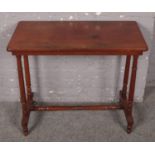 A mahogany centre table raised on turned support. (70cm x 84cm)