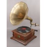 A HMV 'His masters voice' wind up gramophone with brass horn speaker.