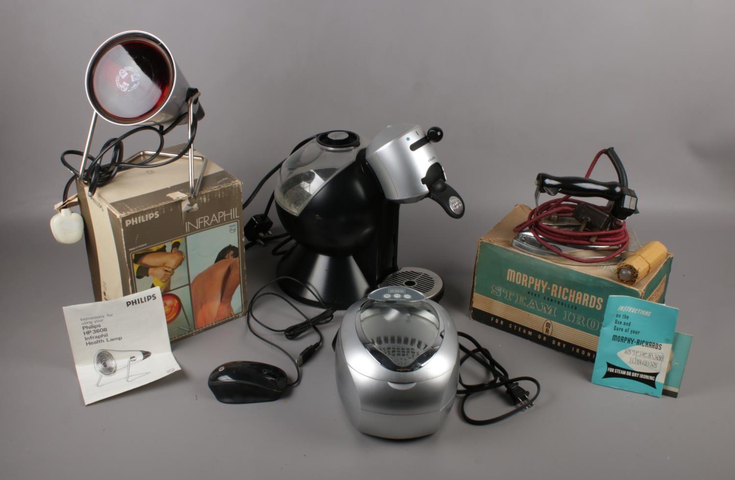 A box of assorted electricals to include - a Dolce Gusto Nescafe coffee maker, a Brookstone