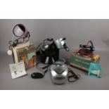A box of assorted electricals to include - a Dolce Gusto Nescafe coffee maker, a Brookstone